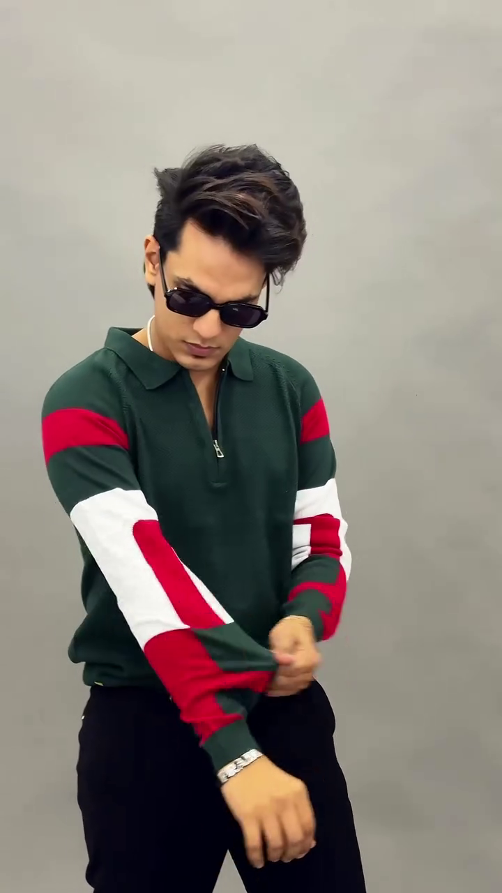 Black Quarter-Zip Polo Shirt with White & Orange Color-Block Sleeves – Sporty Style with Modern Edge
