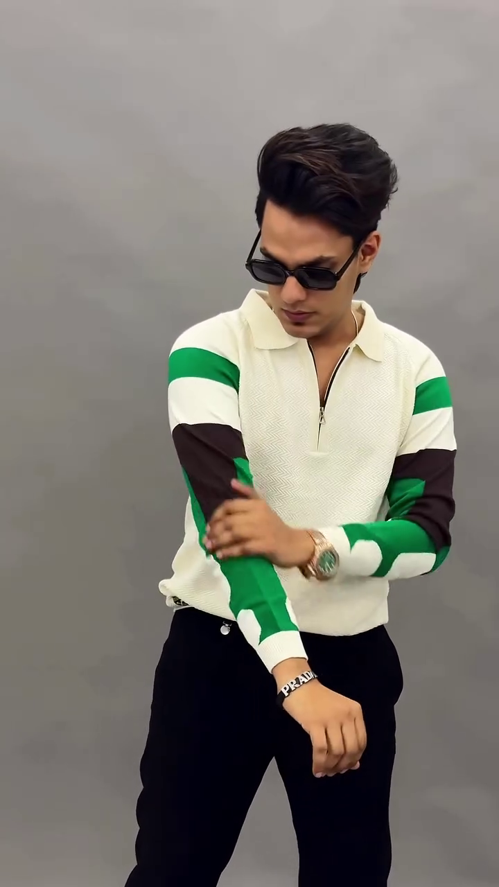Black Quarter-Zip Polo Shirt with White & Orange Color-Block Sleeves – Sporty Style with Modern Edge