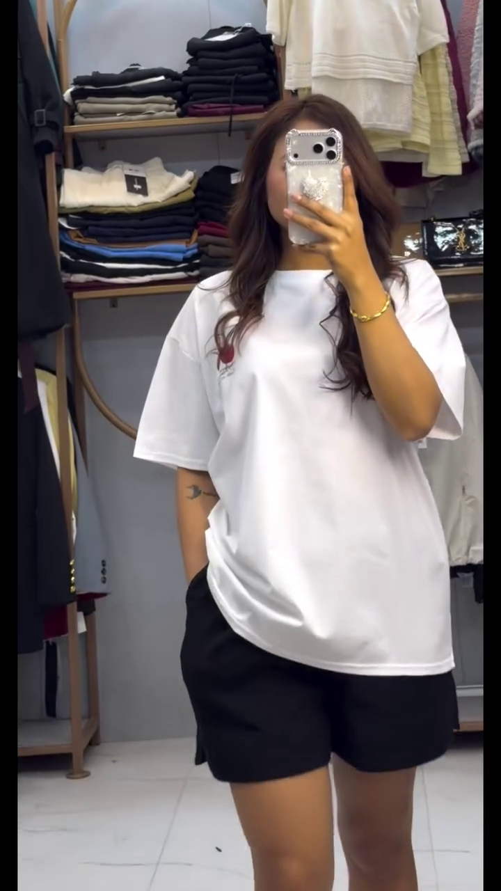 Effortless Street Style: White Oversized Drop-Shoulder T-Shirt with Minimal Chest Graphic