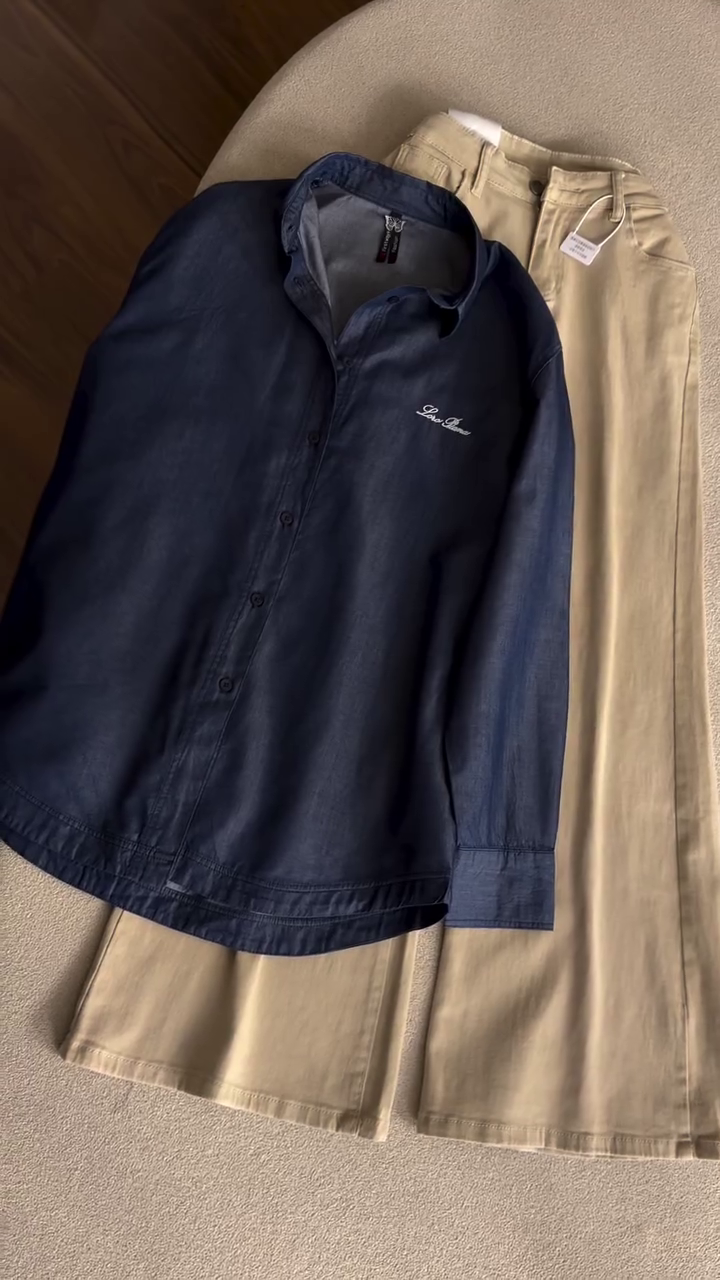 Timeless Casual Elegance: Light Blue Button-Down Shirt with Beige Trousers