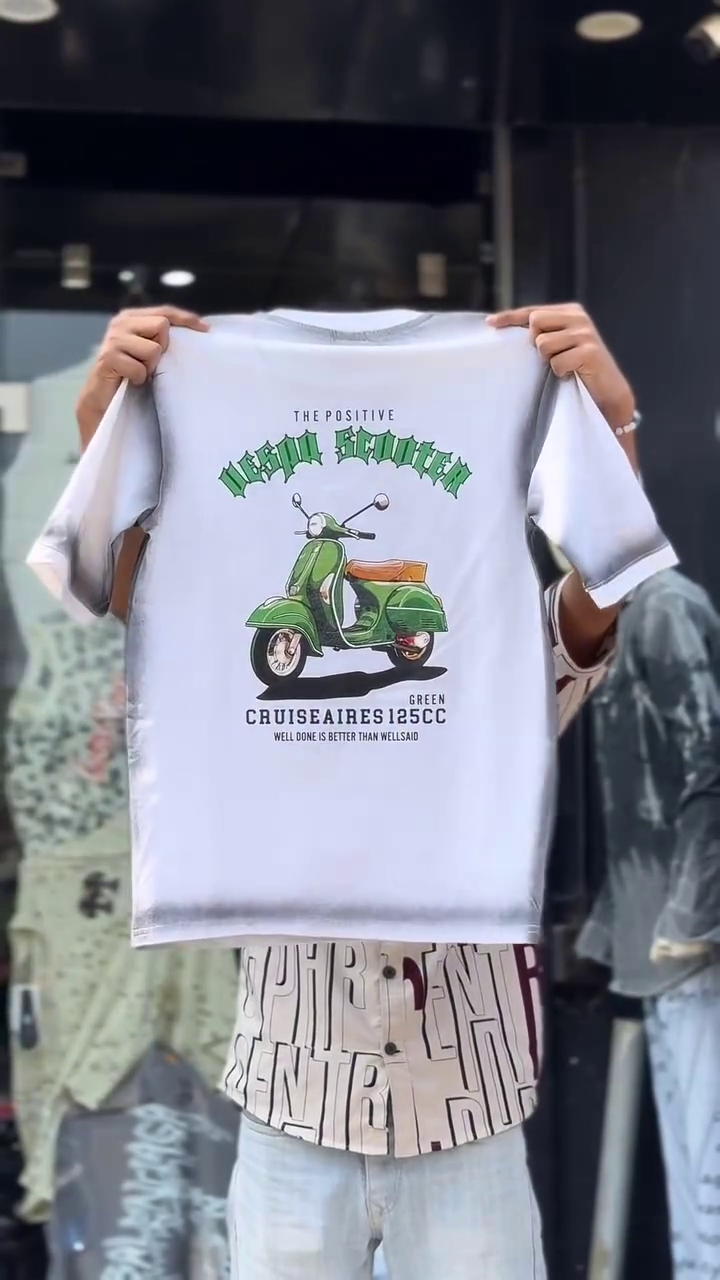 Casual Icon: Red T-Shirt with Vespa Scooter Graphic