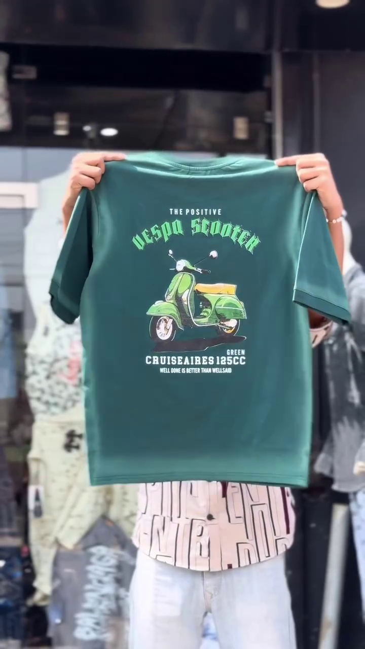 Casual Icon: Red T-Shirt with Vespa Scooter Graphic