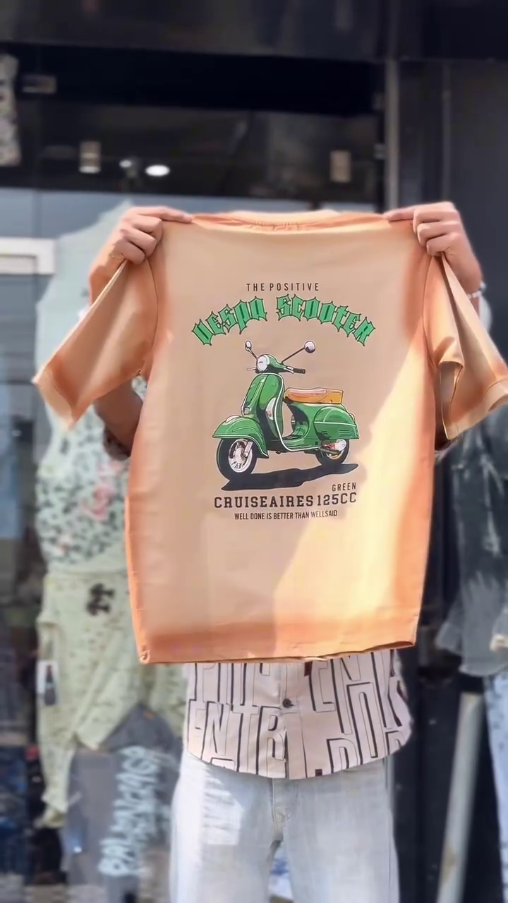 Casual Icon: Red T-Shirt with Vespa Scooter Graphic