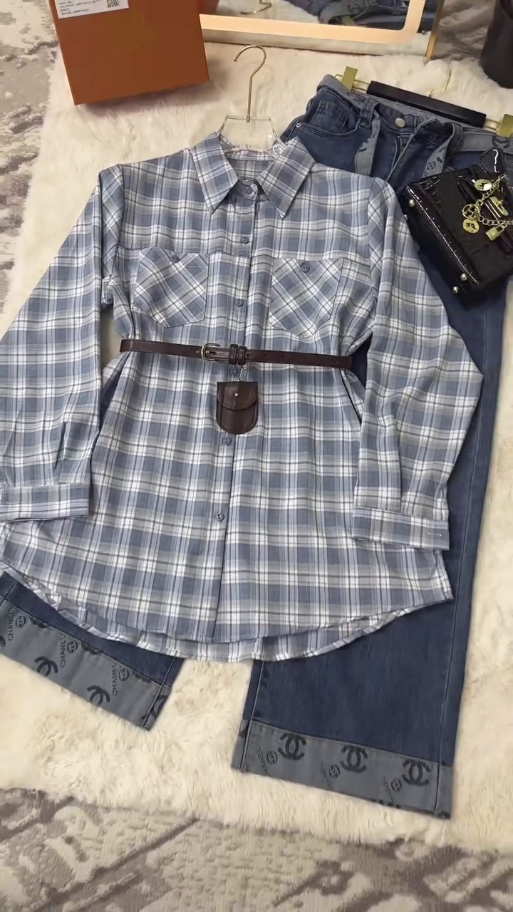 Laid-Back Chic: Plaid Flannel Shirt with Jeans and Belted Styling