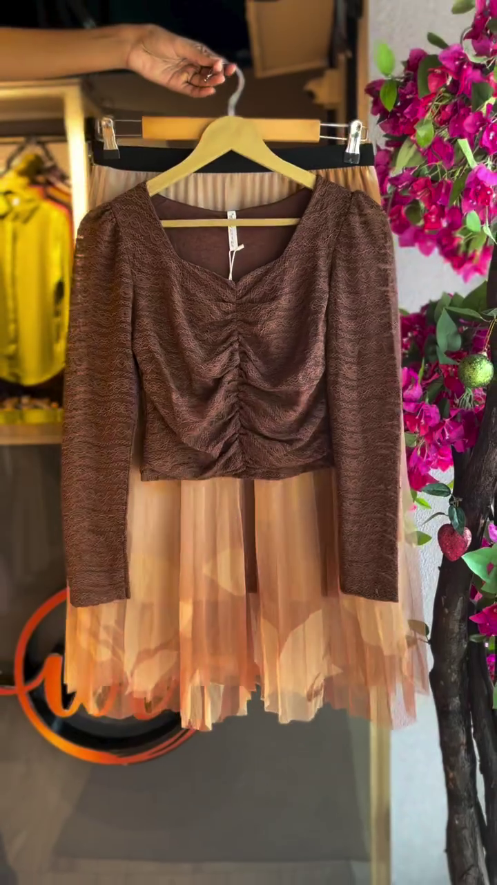 “Effortless Elegance: Styling a Ruched Brown Top with a Pleated Skirt”