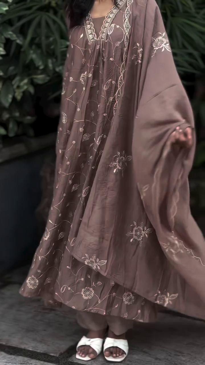 “Elegant Blooms: Styling a Floral-Embroidered A-Line Suit Set”