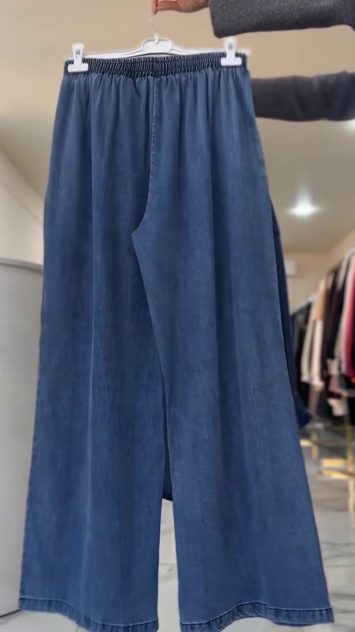 “Denim Duo: Effortless Style with a Matching Shirt and Wide-Leg Trousers”