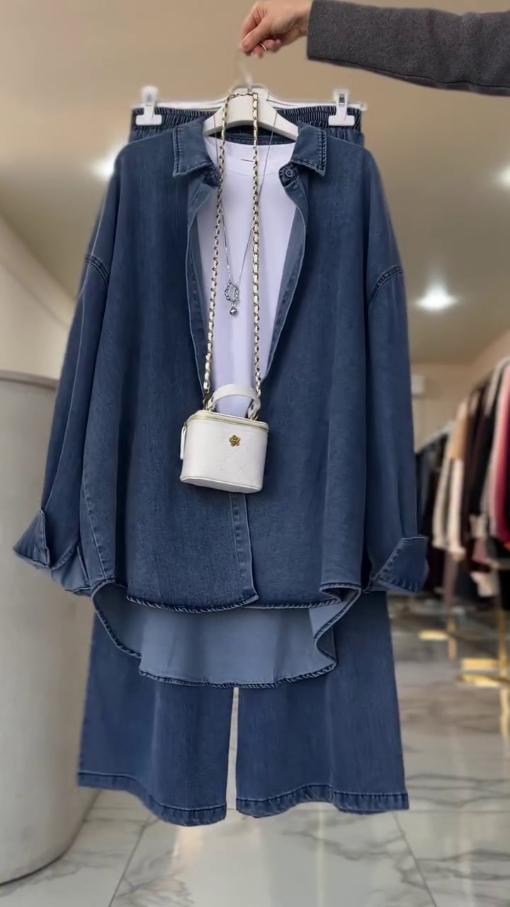 “Denim Duo: Effortless Style with a Matching Shirt and Wide-Leg Trousers”