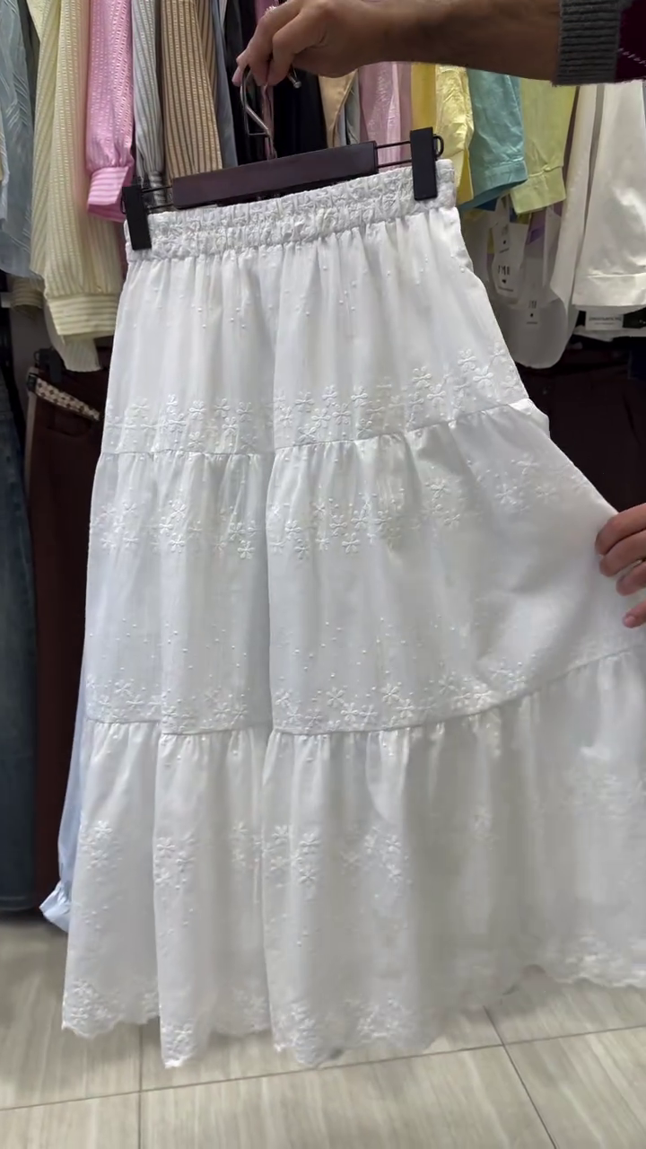 “Classic Elegance: Styling a Long-Sleeve Button-Up Top with a Skirt”