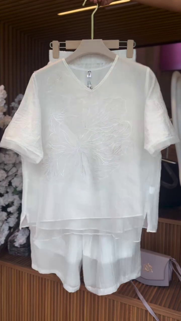 “Effortless Elegance: White Embroidered Co-Ord Set with Matching Skirt”