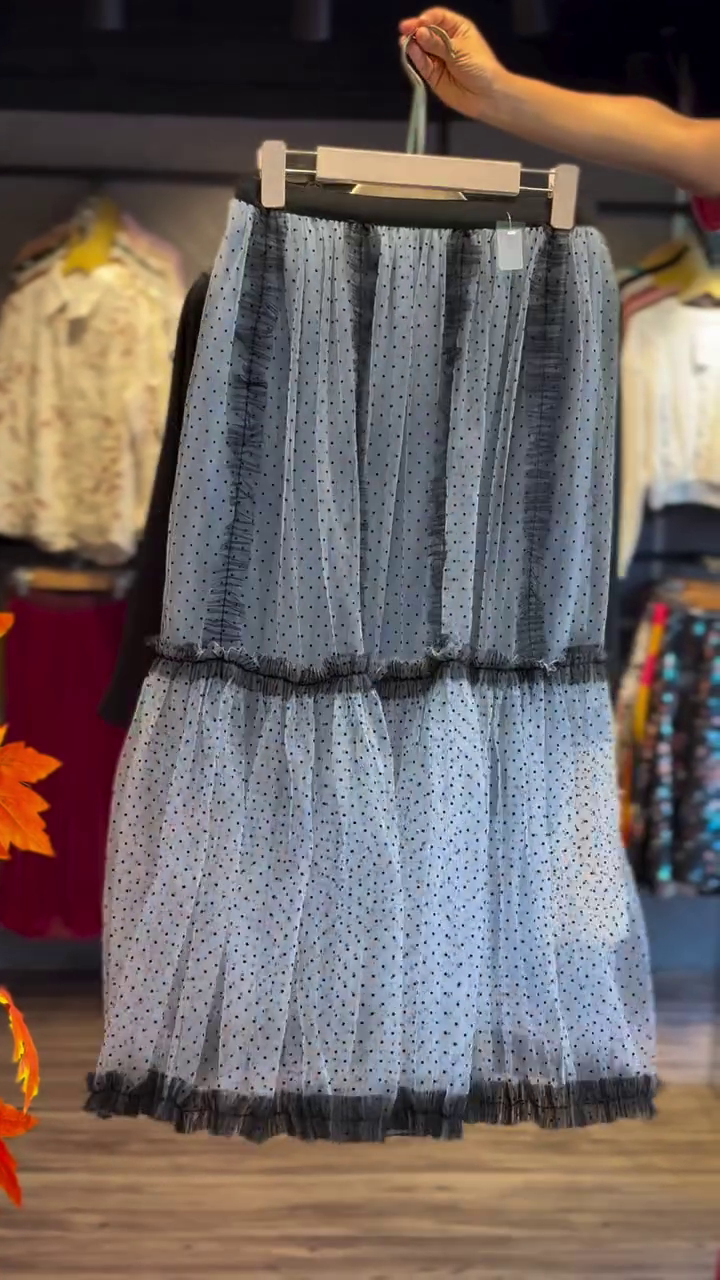“Playful Elegance: Black Long-Sleeve Top with Polka-Dot Tulle Skirt Set”