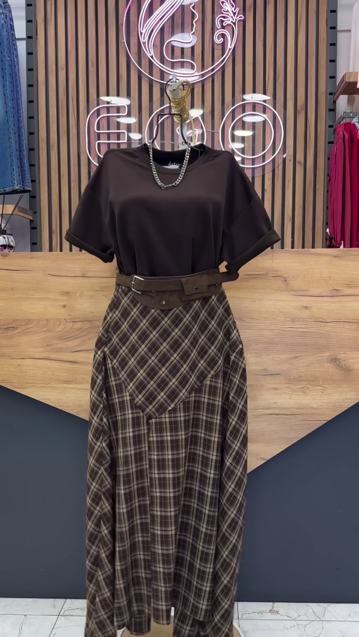 “Classic Meets Contemporary: Dark Top with Plaid Long Skirt and Belt”