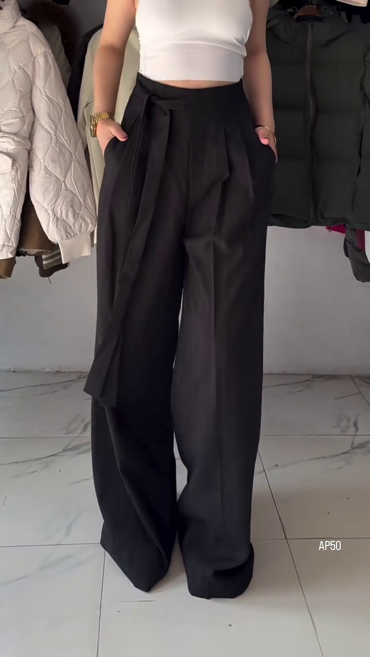 “Effortless Elegance: High-Waisted Wide-Leg Striped Trousers for Women”