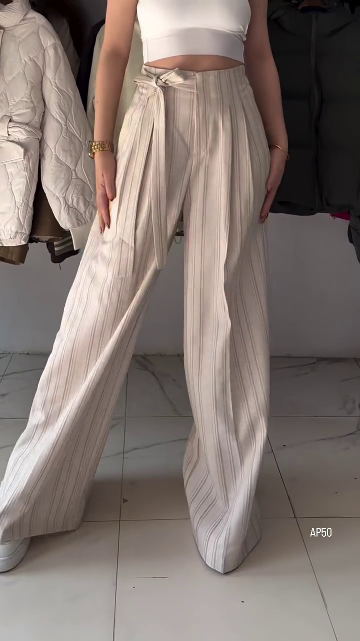 “Effortless Elegance: High-Waisted Wide-Leg Striped Trousers for Women”