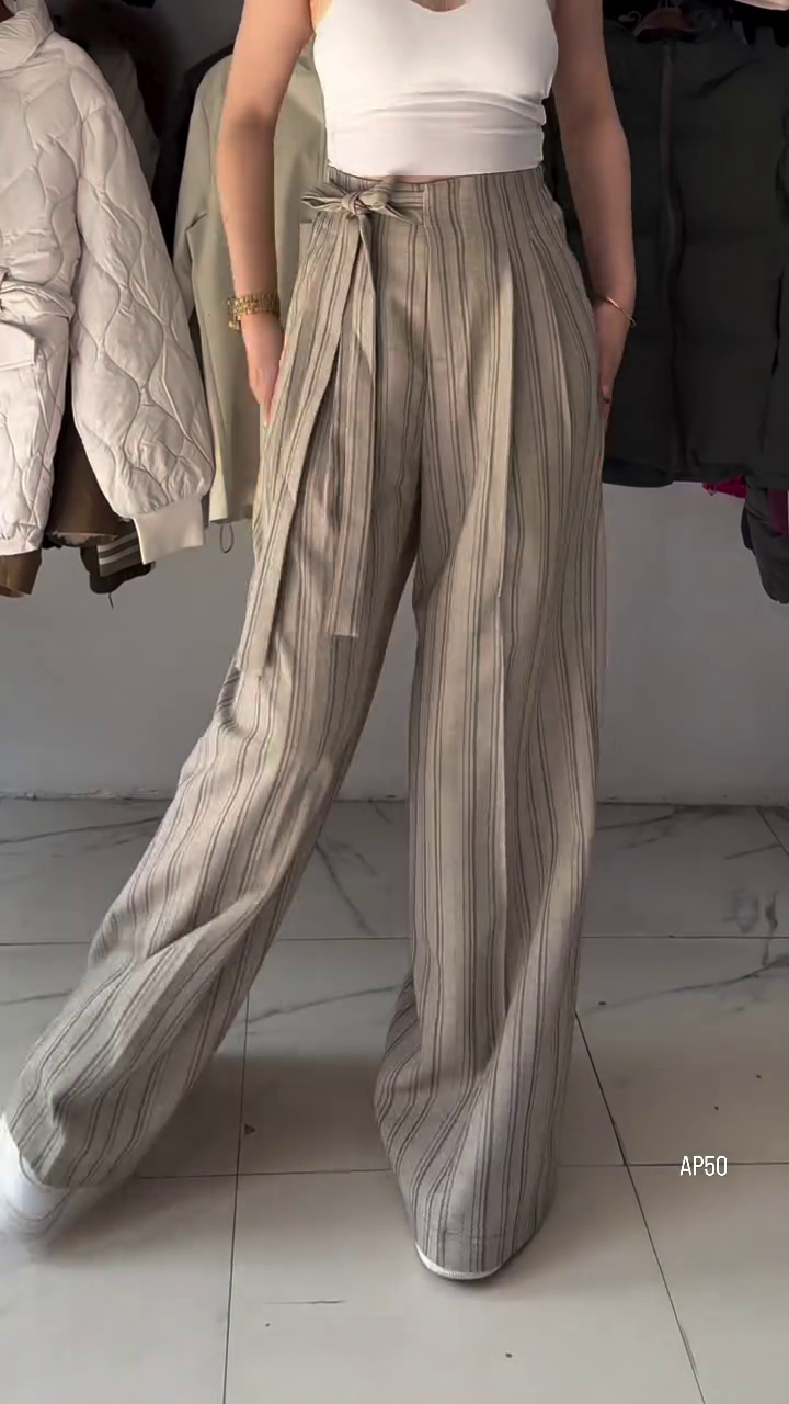“Effortless Elegance: High-Waisted Wide-Leg Striped Trousers for Women”