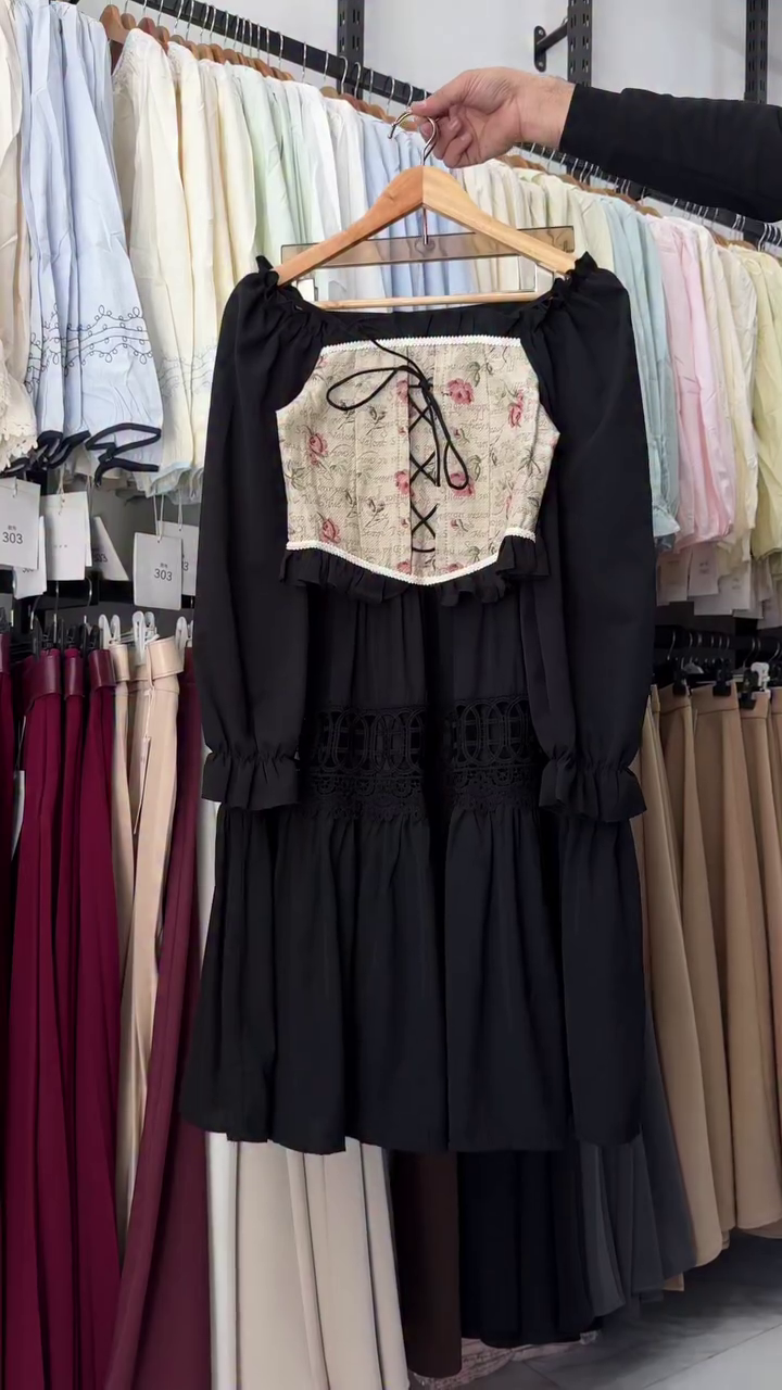 “Romantic Edge: Black Midi Dress with Floral Corset Bodice and Lace-Up Detail”