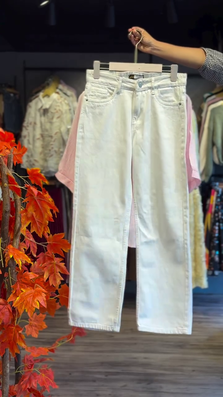 “Soft Elegance: Light Pink Embroidered Shirt with White Trousers”