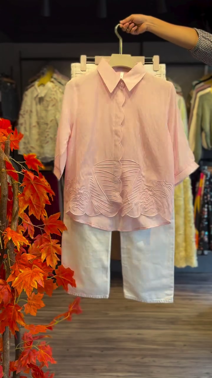 “Soft Elegance: Light Pink Embroidered Shirt with White Trousers”