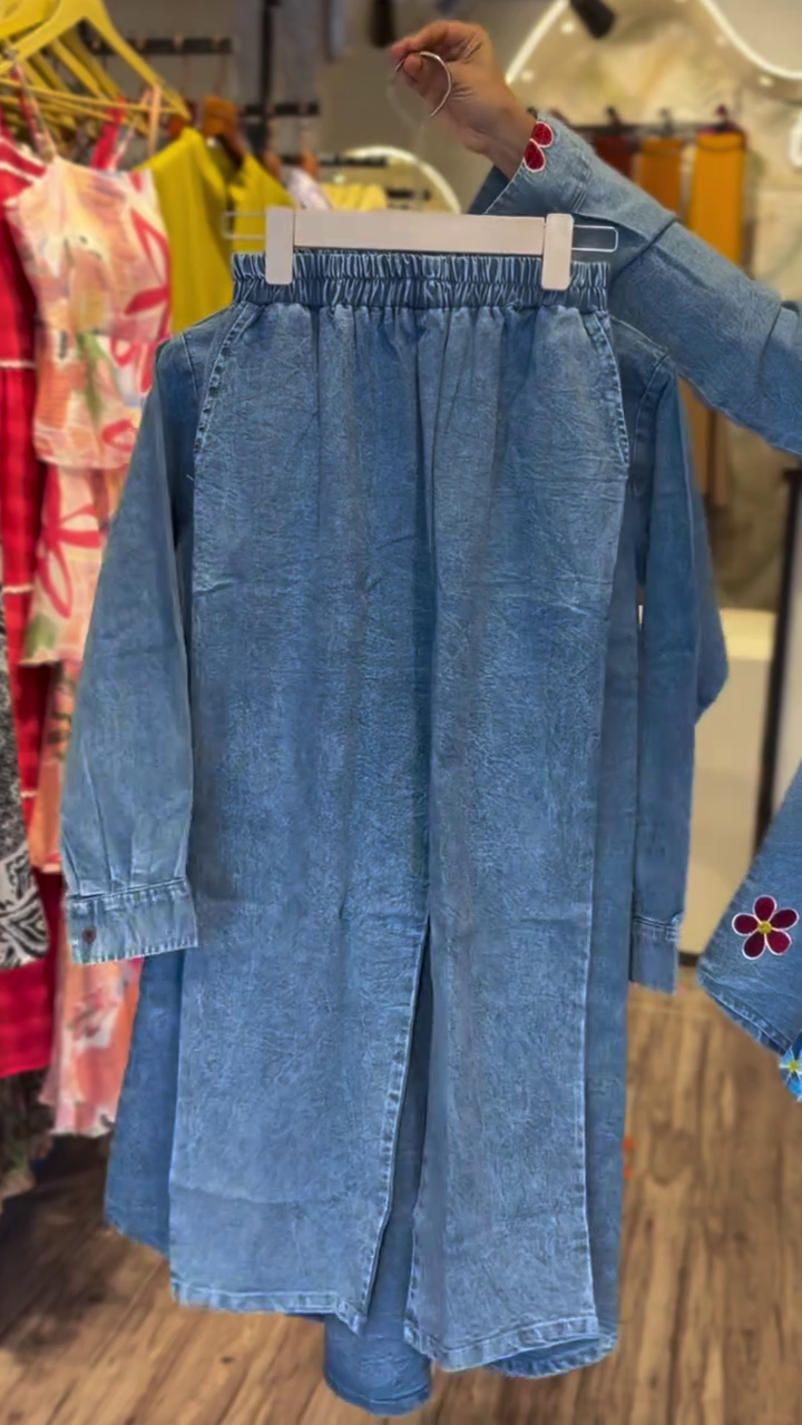 “Bold & Chic: Black Denim Shirt with Colorful Floral Embroidery”