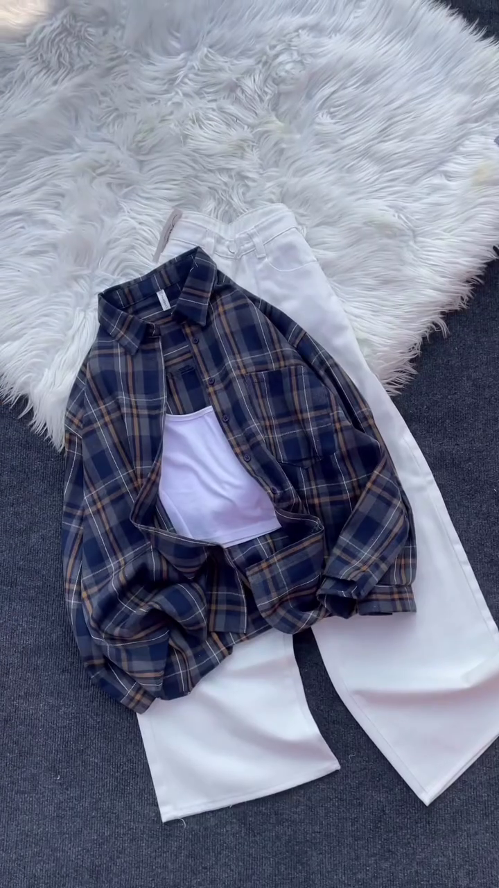 “Casual Comfort: Plaid Flannel Shirt with White Trousers”