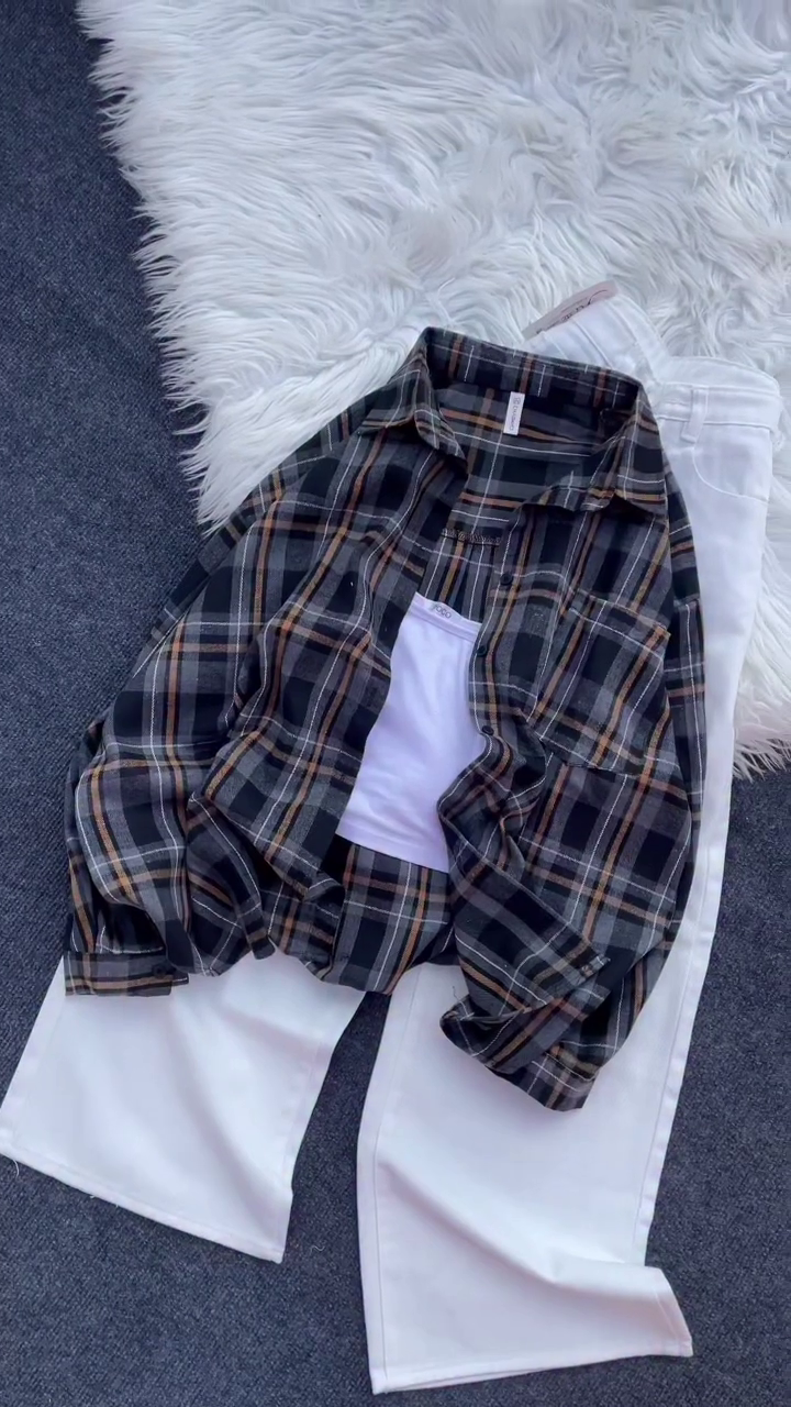 “Casual Comfort: Plaid Flannel Shirt with White Trousers”