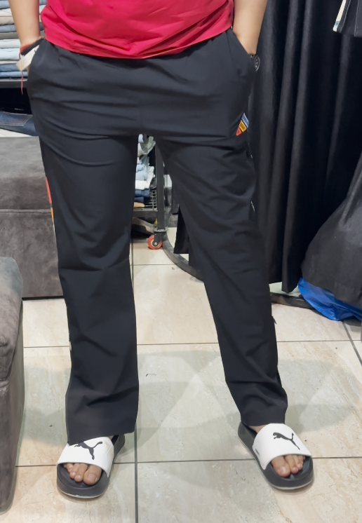 “Casual Cool: Black Track Pants with Side-Stripe Detailing”