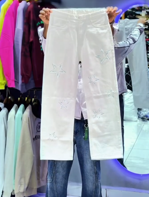 Streetwear Fun Meets Edge: Baggy Charcoal Denim Jeans with Cartoon Character Patches