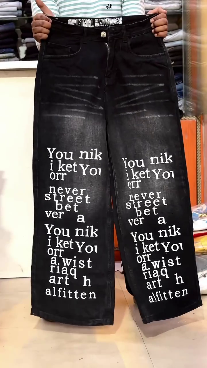 Urban Edge Statement: Black Wash Baggy Denim Jeans with White Graffiti Graphics
