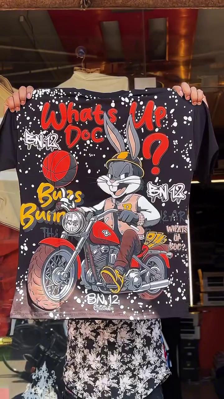 Playful Street Style: White Graphic T-Shirt Featuring Bugs Bunny Motorcycle Design