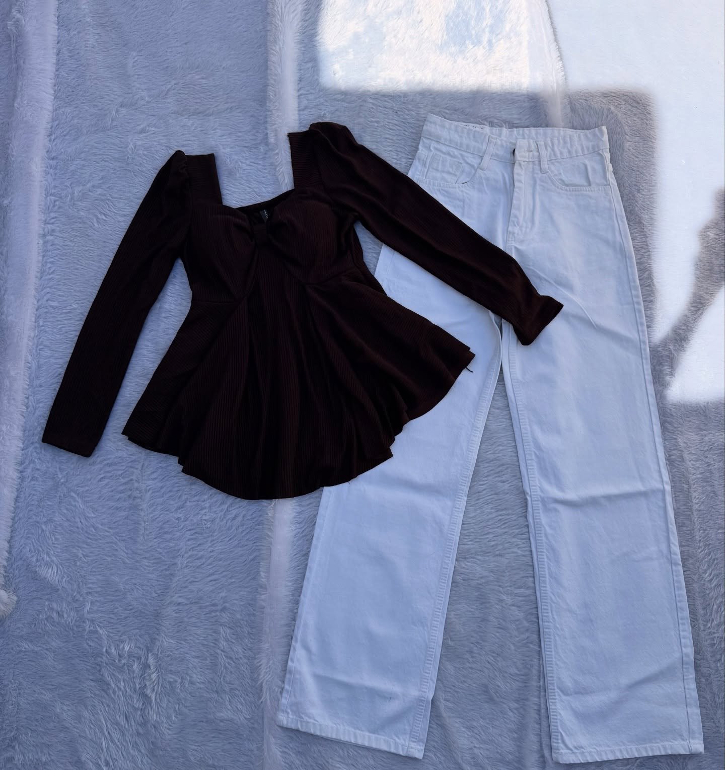 Elegant Contrast Style: Purple Square-Neck Peplum Top Paired with Black Wide-Leg Jeans