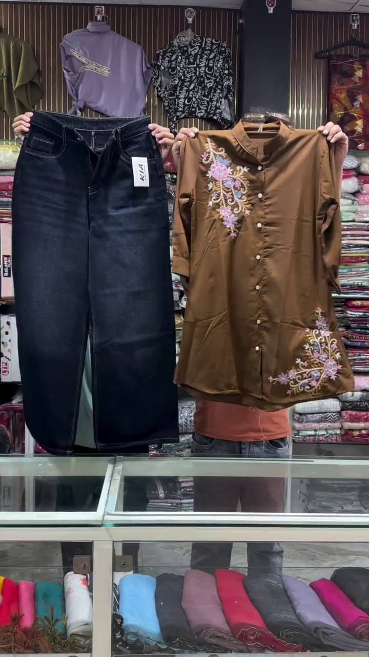 Fusion Flair: Embroidered Lime Kurti with Classic Black Denim Jeans