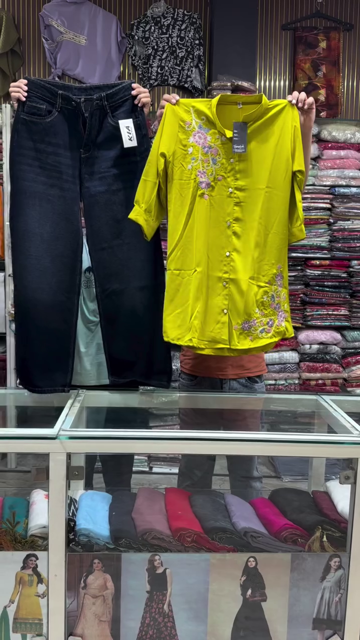 Fusion Flair: Embroidered Lime Kurti with Classic Black Denim Jeans