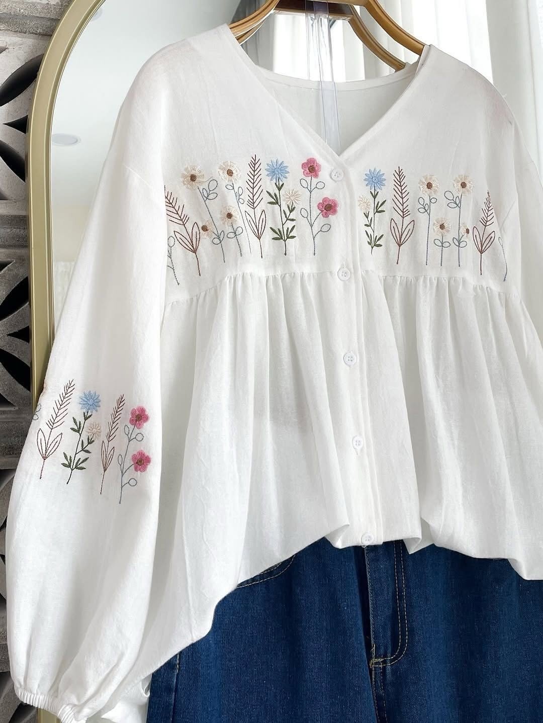 Elegant Floral Embroidered  Tunic Top with Light Wash Denim Jeans – Chic Casual Outfit for Women