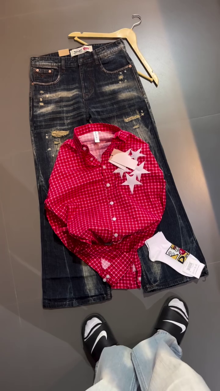Trendy Red Checked Shirt and Distressed Denim Jeans Combo for a Stylish Casual Look
