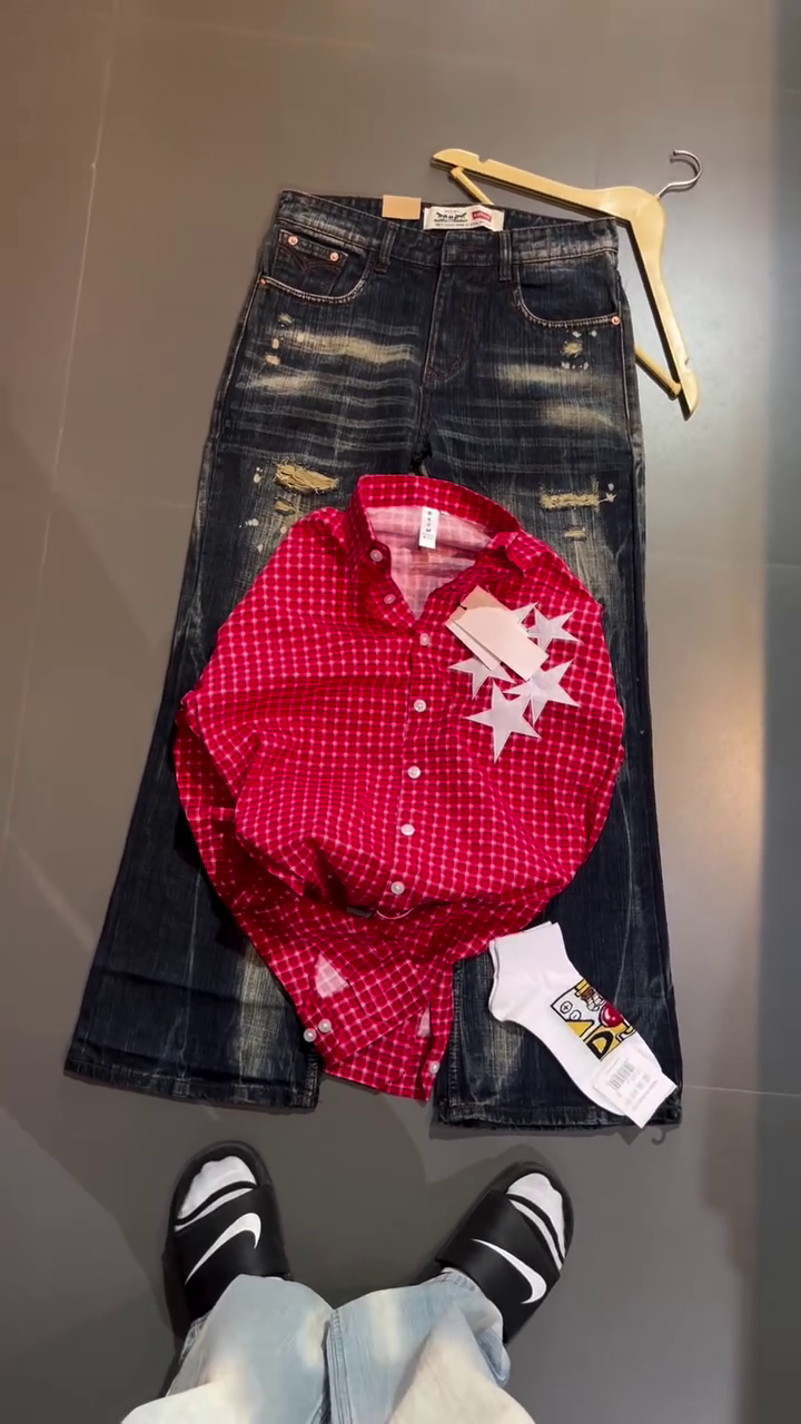 Trendy Red Checked Shirt and Distressed Denim Jeans Combo for a Stylish Casual Look