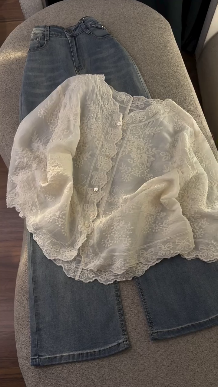 Elegant White Lace Blouse with Classic Blue Wide-Leg Jeans