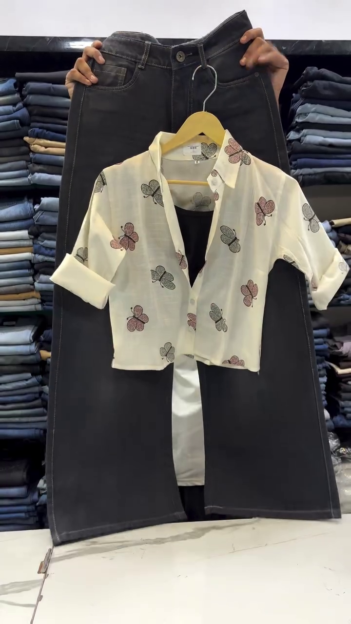 Trendy Butterfly Print Crop Shirt with Black Wide-Leg Jeans for a Chic Everyday Look